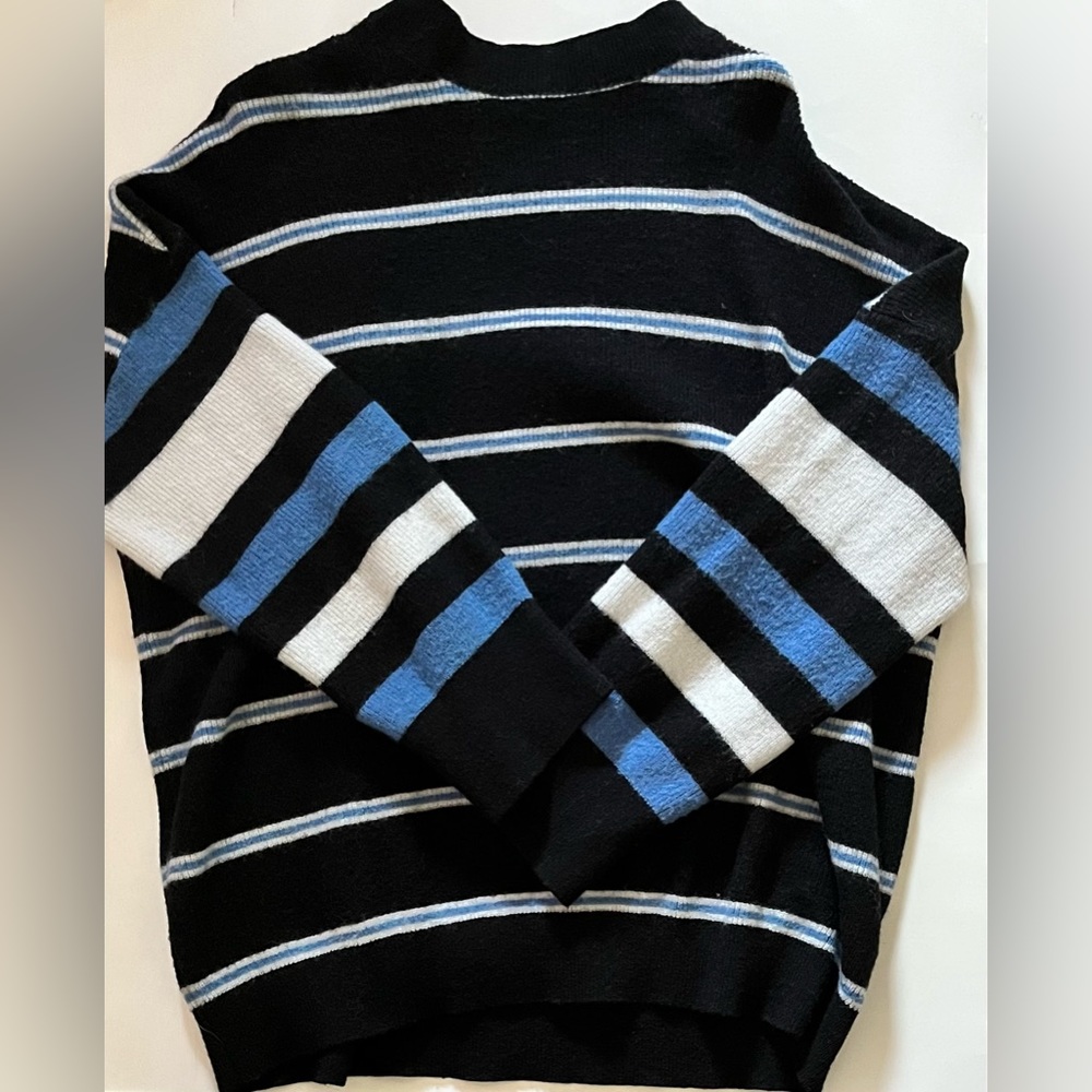 A soft blue black and white sweater. Great for the winter